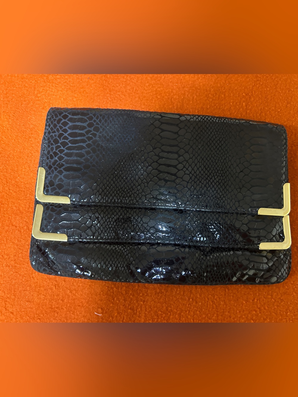 Michael Kors Black Snake-Embossed clutch with Gold Corner Hardware